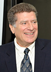 Ted Wachtel in a suit and tie